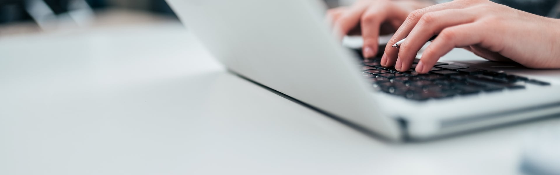 Typing on laptop