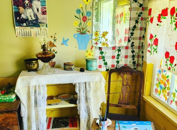 Interior of Maud Lewis replica house in Digby, NS