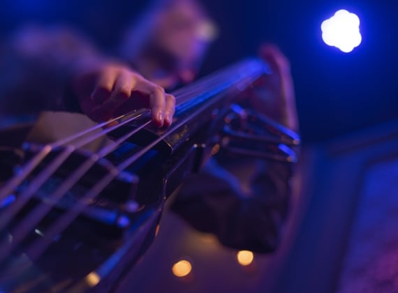 Double bass at a concert - stock photo man playing double bass at a concert
