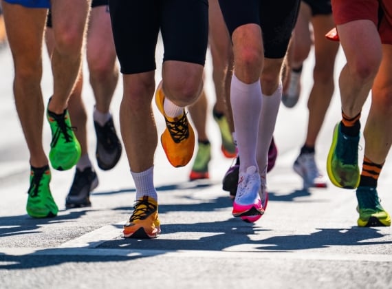 Lower half image of runners