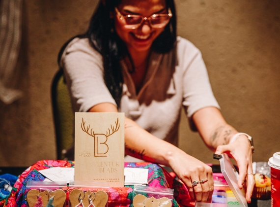 Woman's booth at the Indigenous Christmas Artisan Market 